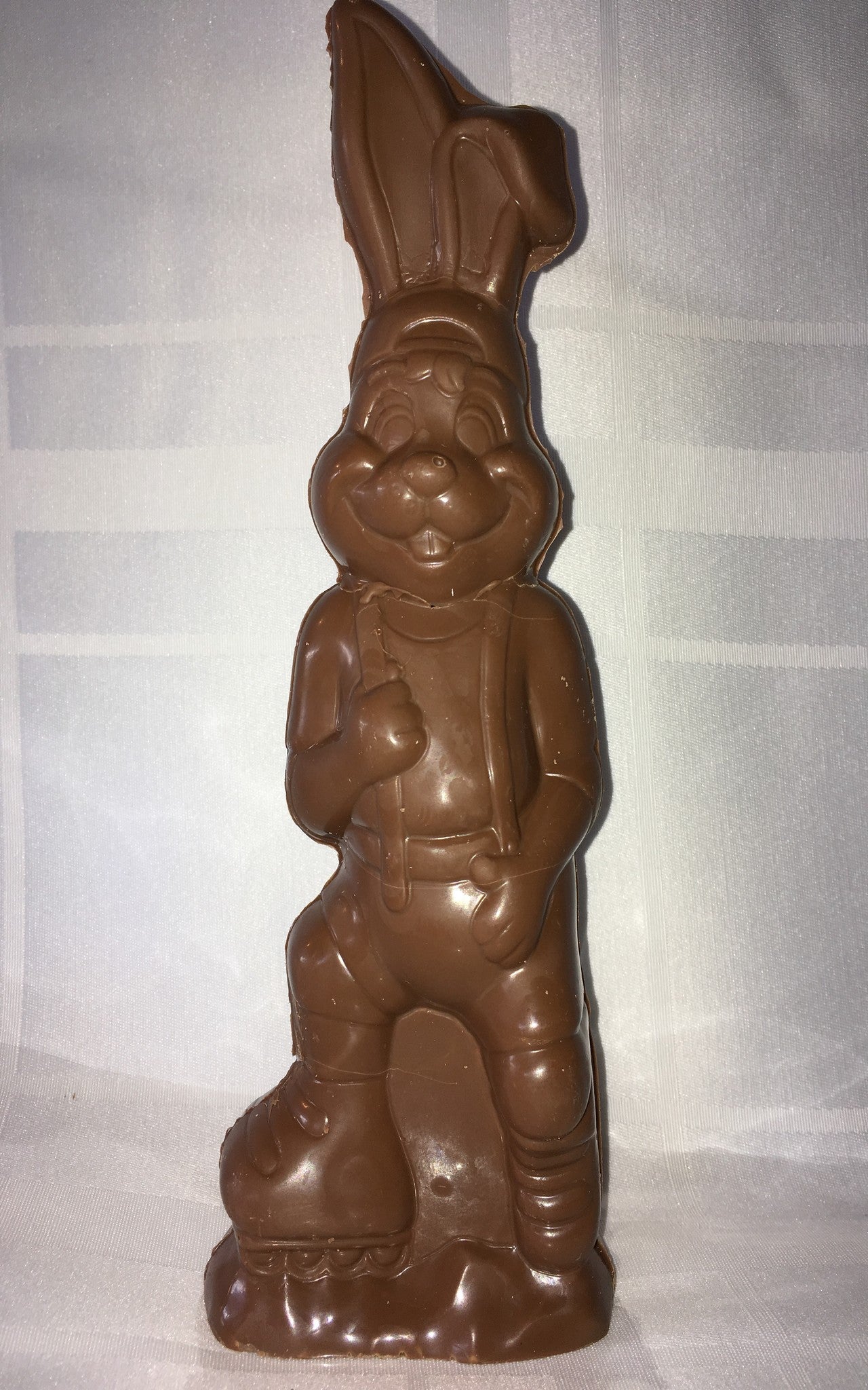 Chocolat belge lapin garçon en patin 240g environ